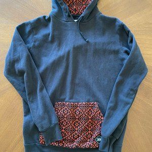 Krochet Kids Brand Hoodie. Black with pattern detail